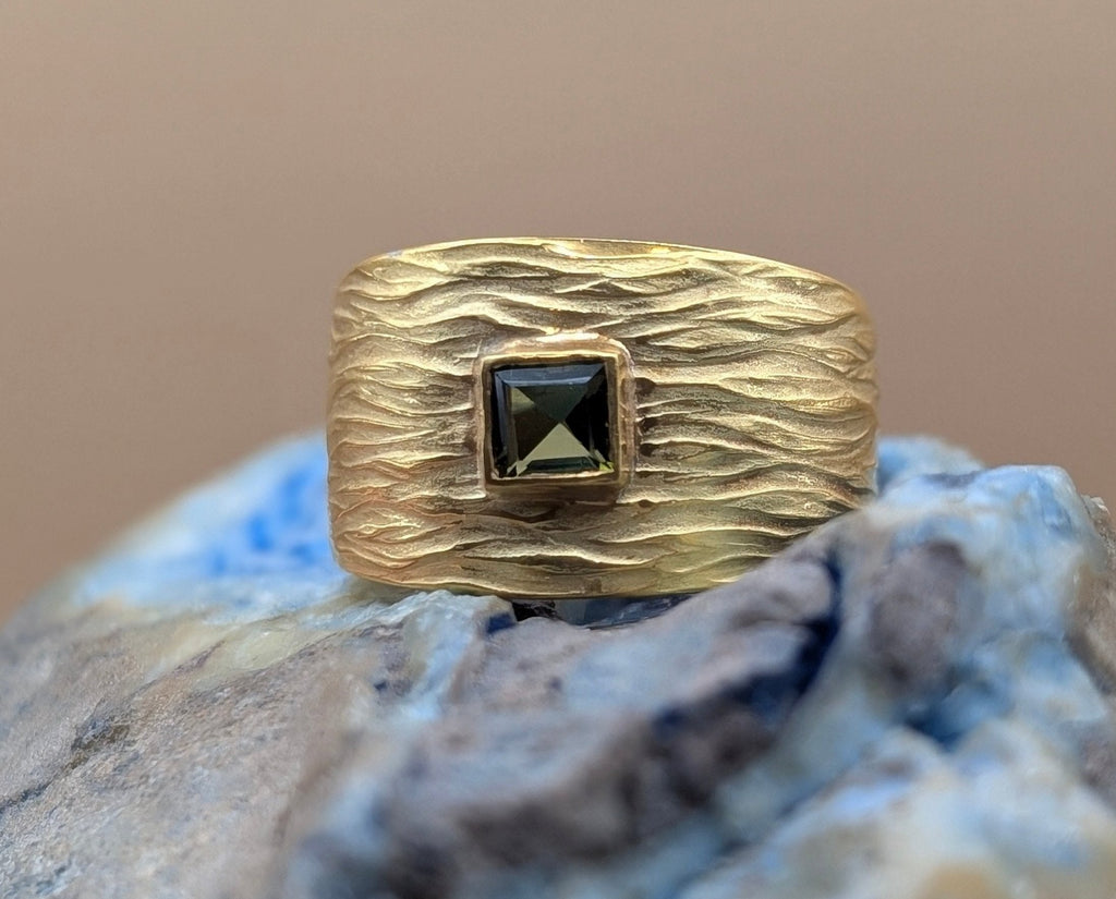 Gold Textured Ring with Emerald Green Stone