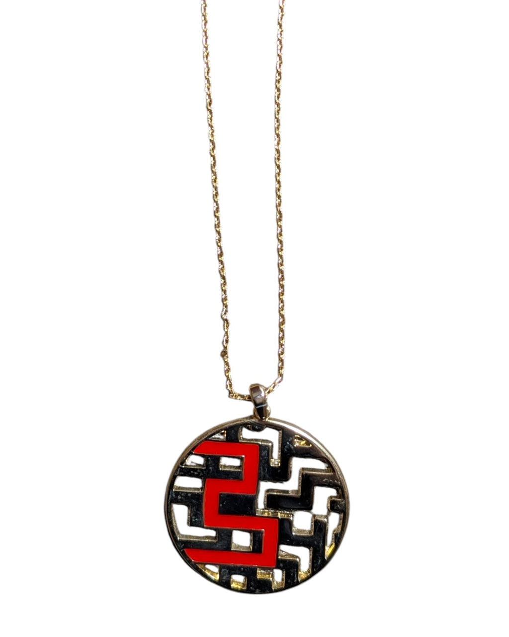 Long yellow-tone steel necklace with a round geometric pendant featuring red, black, and white enamel
